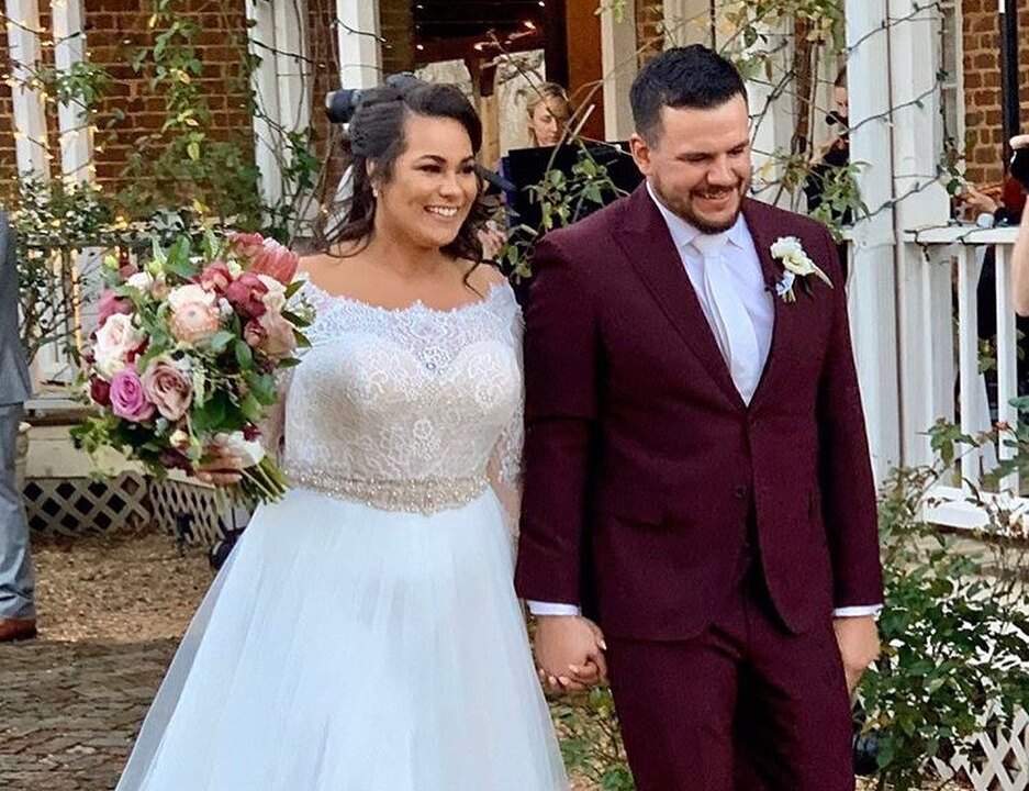 Kyle Schwarber with his wife