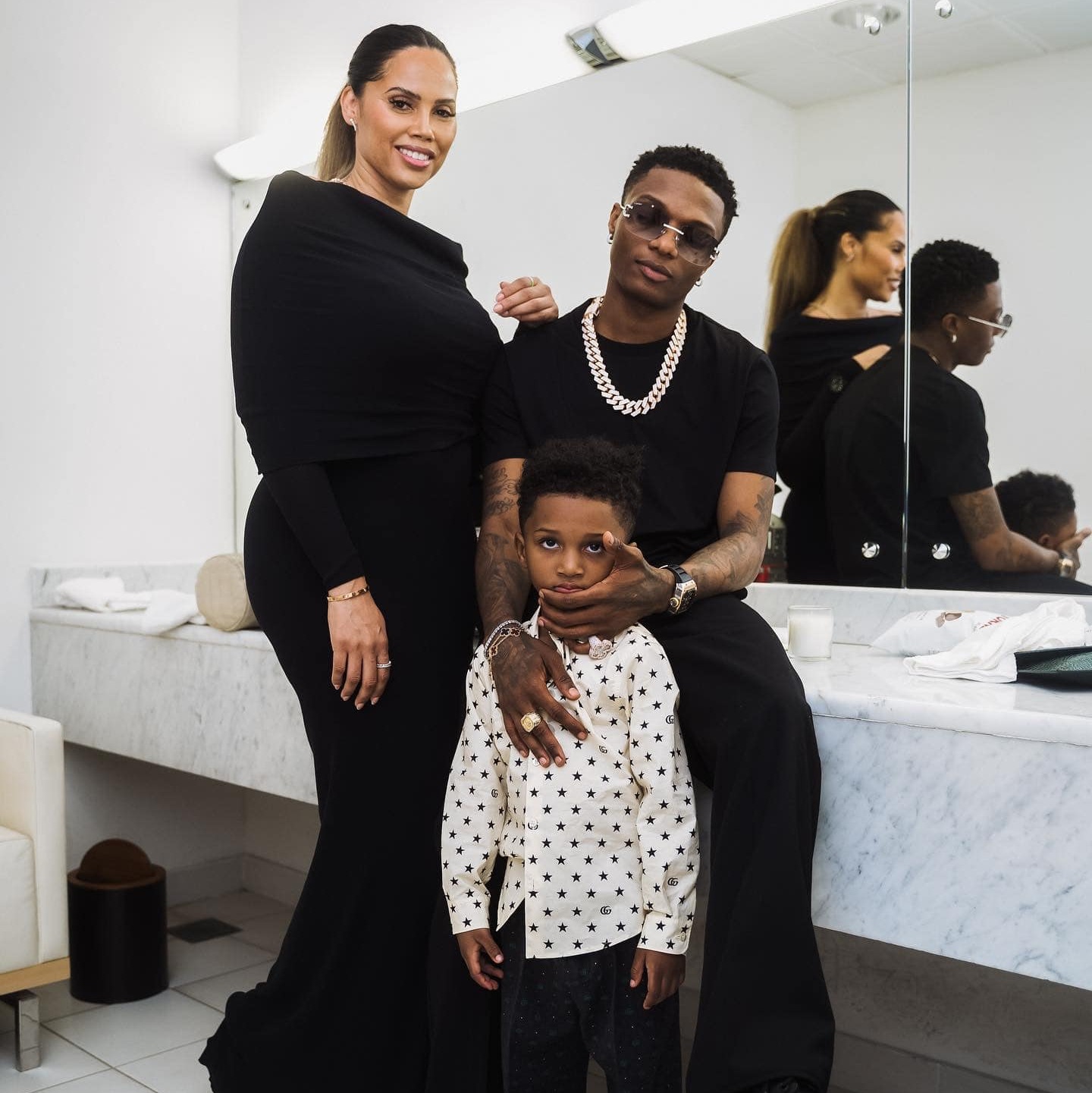 Wizkid and Jada Pollock with their son