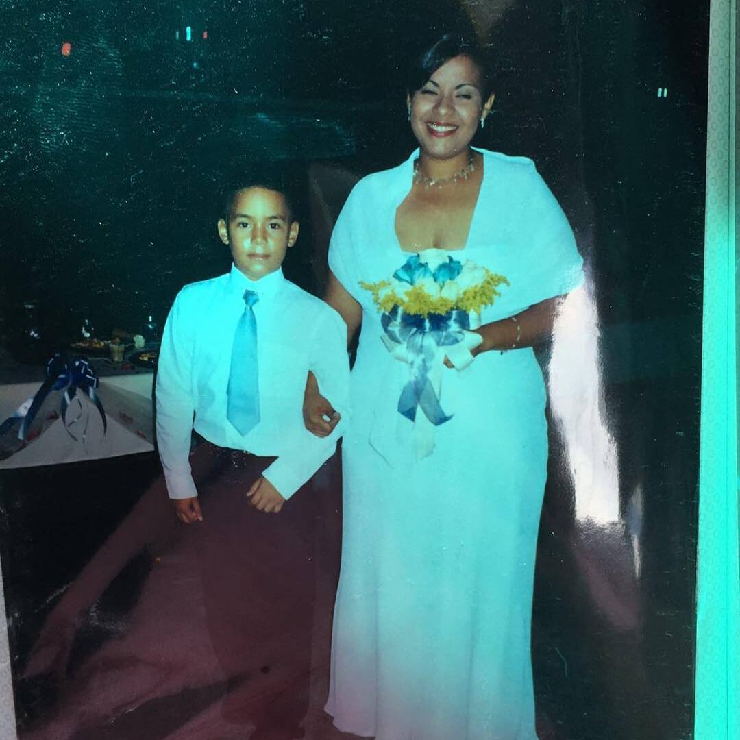 Young Carlos Correa with his mother