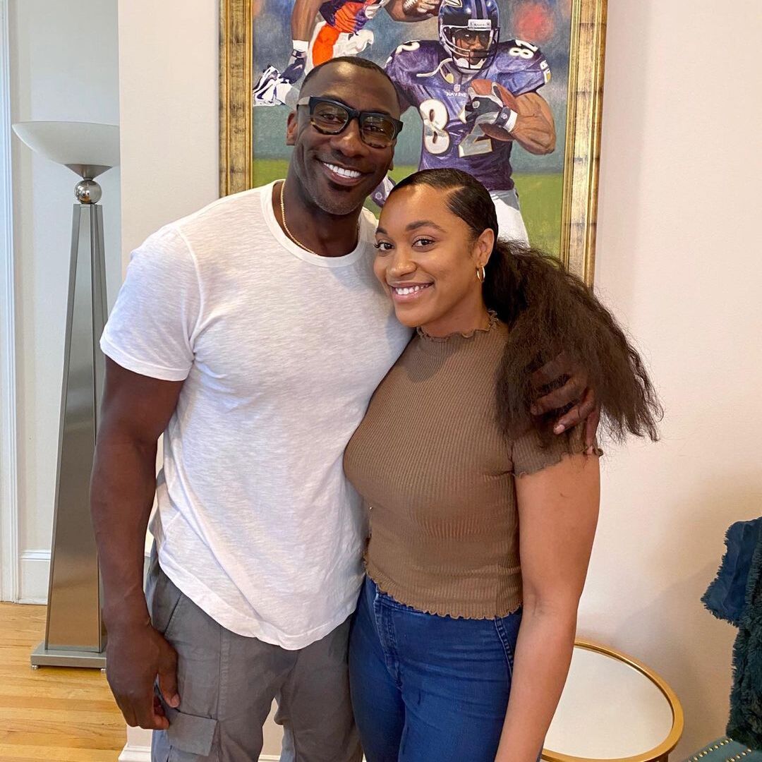 Shannon Sharpe with his daughter