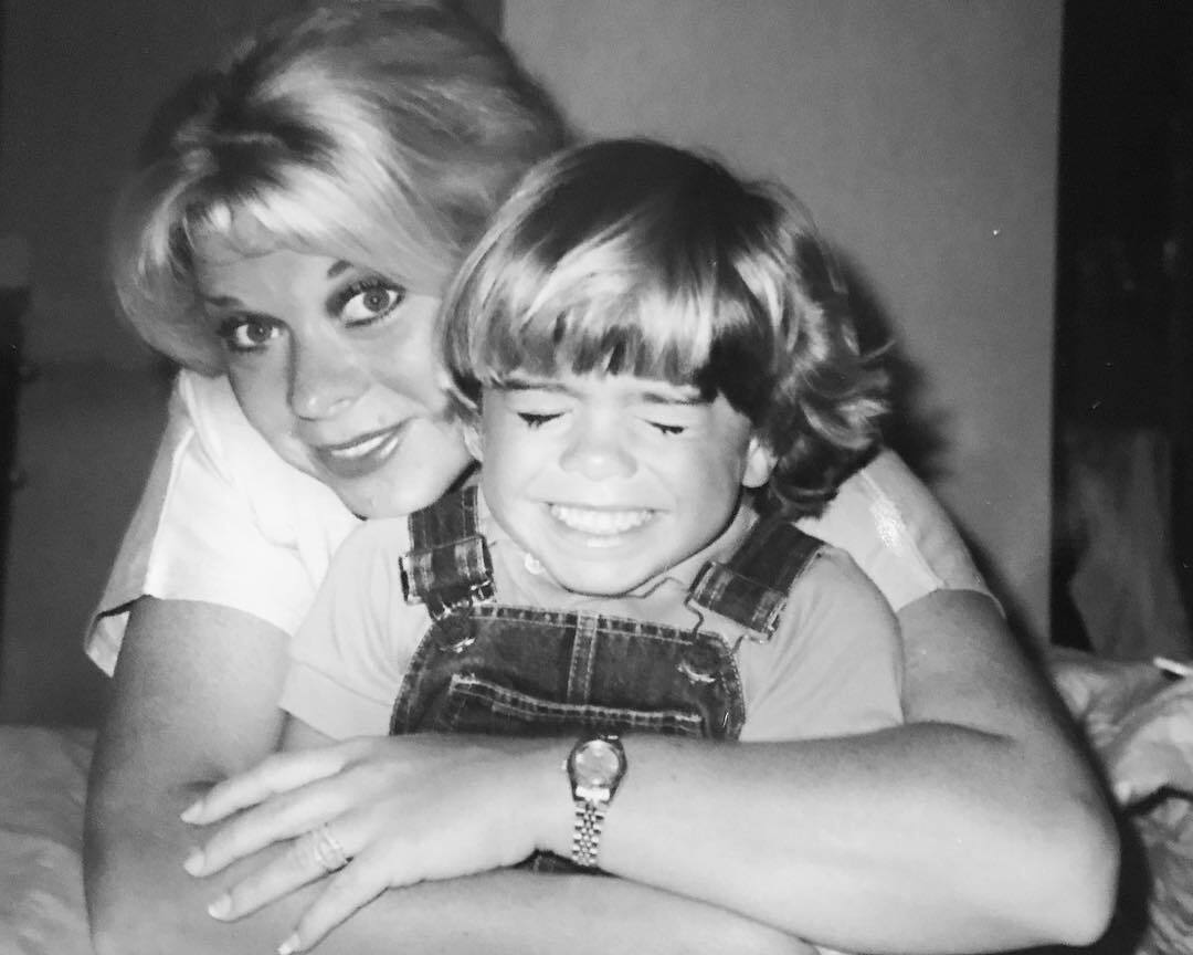 Young Matthew Lawrence with his mother