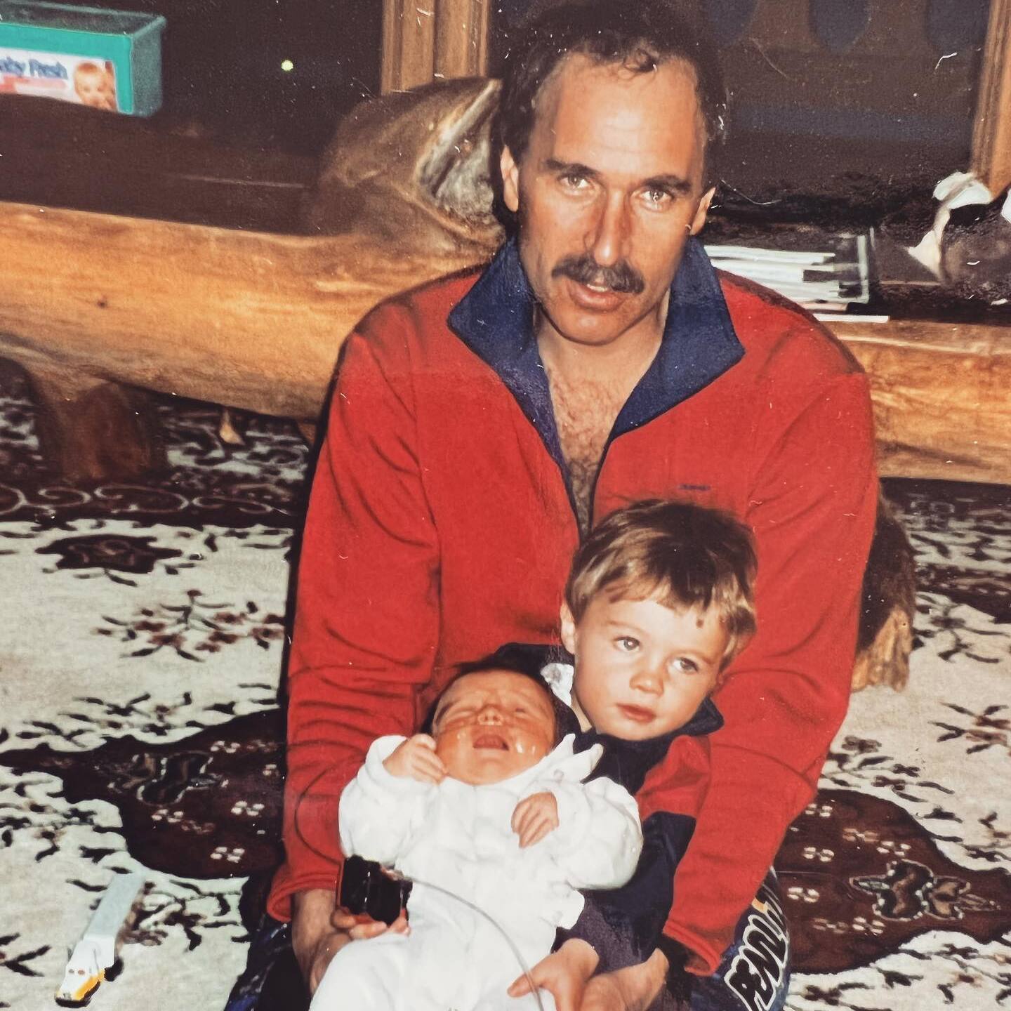 Young Mikaela Shiffrin with her brother and father