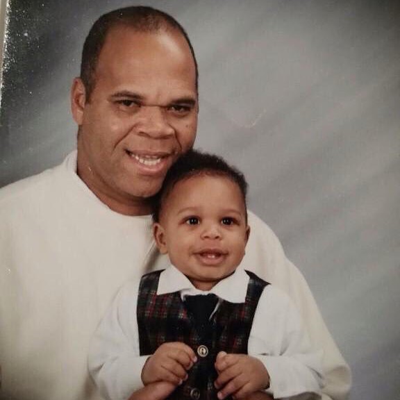 Young Miles Bridges with his father