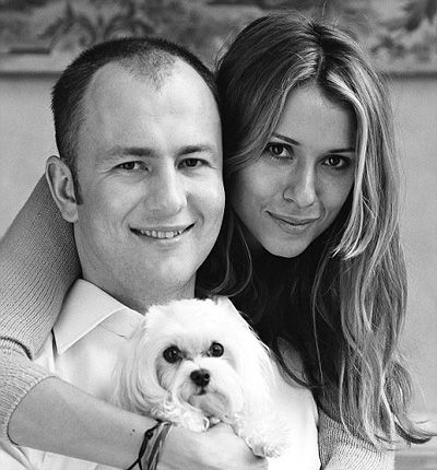 Andrey Melnichenko with wife