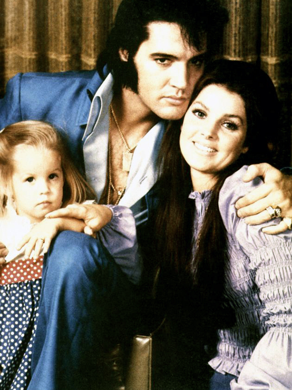 Elvis Presley with his wife and daughter