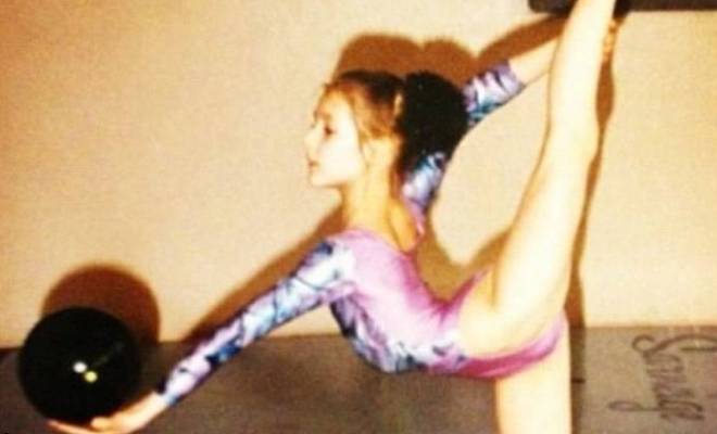 Мaria Kozhevnikova in her childhood at the gymnastics class
