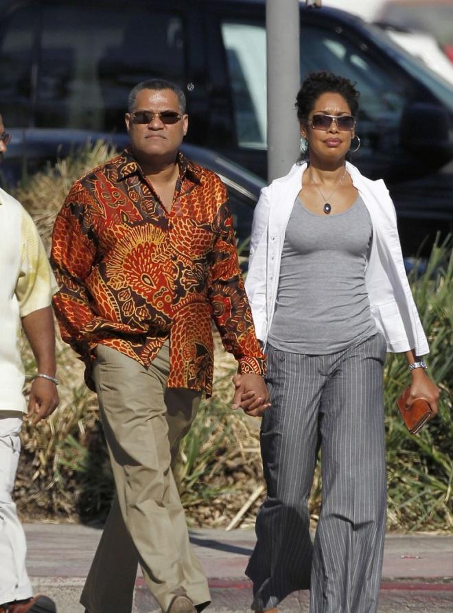 Gina Torres and Lawrence Fishburne